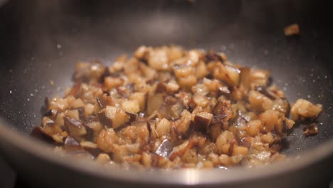 Steamy-Eggplant-Cubes-Cooking-In-A-Wok