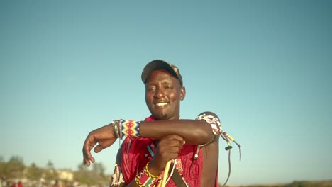 aborigine african maasai warrior man wearing traditional dress and jewelry in kenya