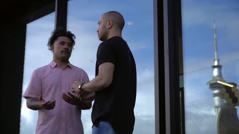 casual business men having discussion outside in auckland city