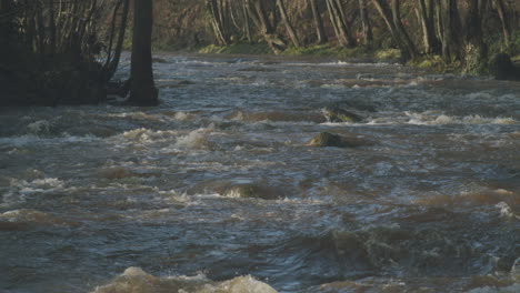 north york moors, river esk in full flow flood, late summer, autumn time, slow motion - clip 2