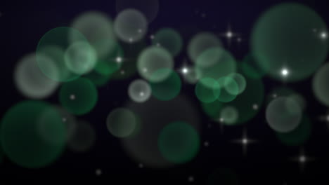 cae el bokeh redondo verde y brilla en el fondo de la moda