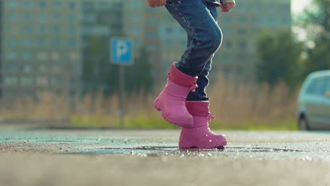 close up kid in wet pants and rubber