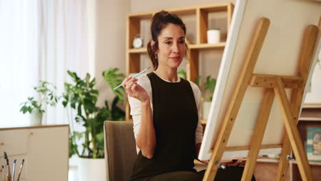 woman painting at home