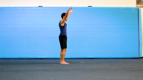 a still shot of a guy doing back flips from the spot