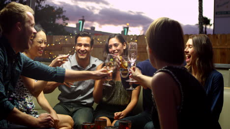 friends enjoying night out at rooftop bar shot on r3d