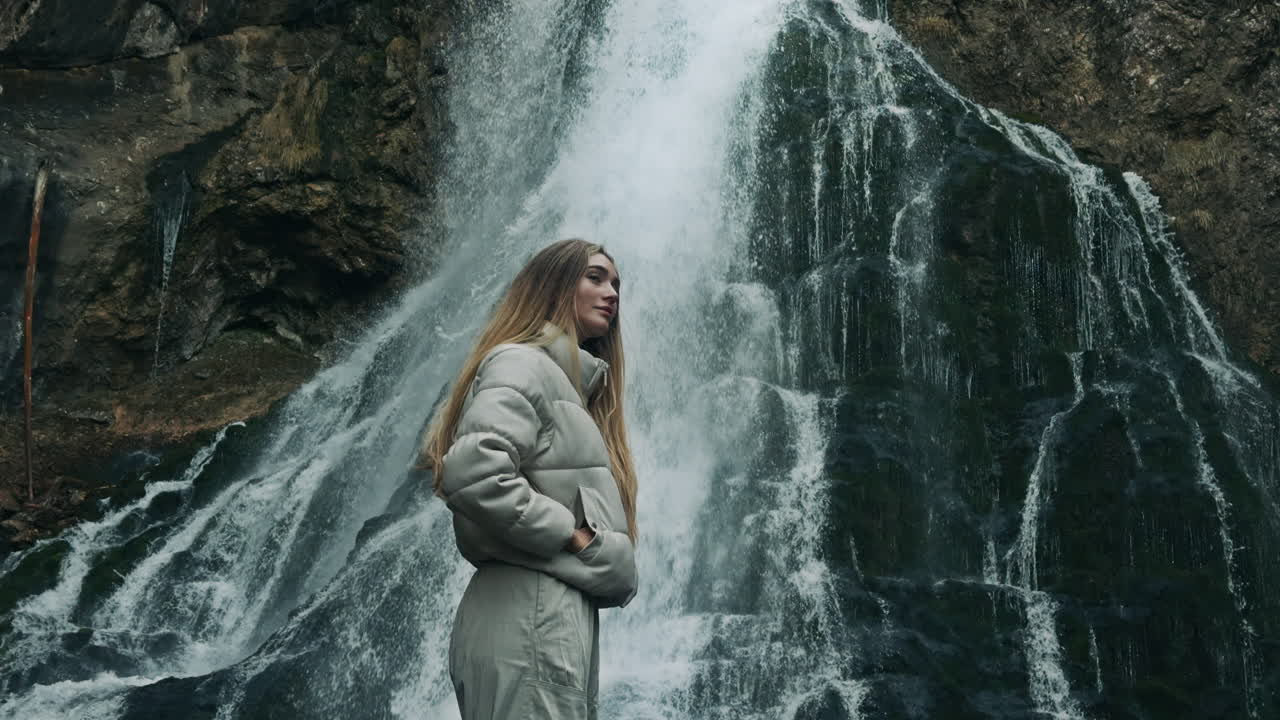 Woman by a Waterfall