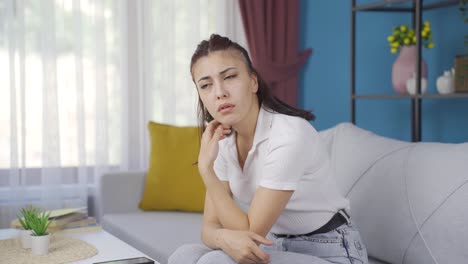 young woman nodding in a positive way.