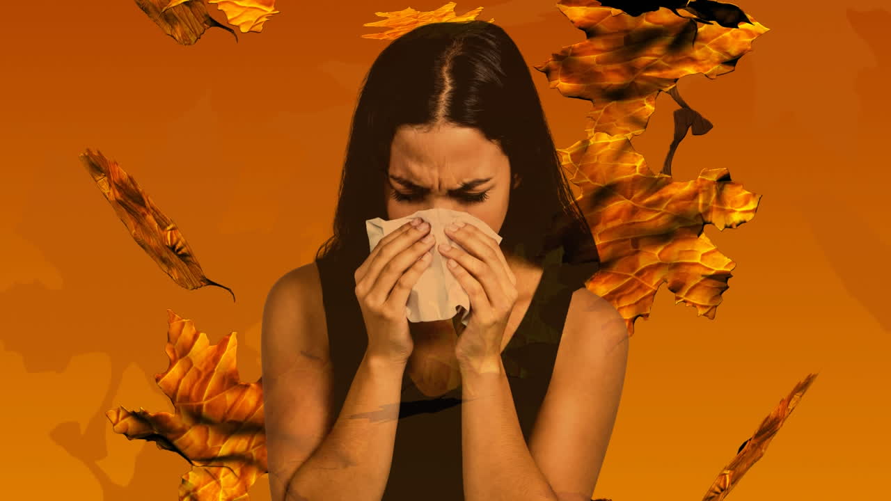 가을 잎이 떨어지고 알레르기를  ⁇ 고 있는 소녀가 재채기 4k