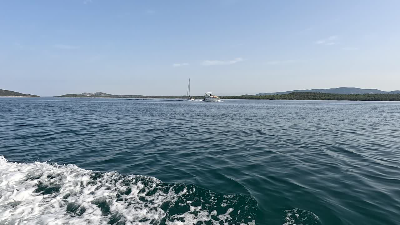 Mediterranean paradise, sailing boats navigating turquoise waters near Croatian coast, exploring islands