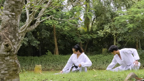 young couple getting ready for taekwondo