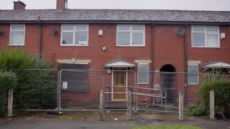 house in a state of subsidence, foundation has shifted and caused cracks