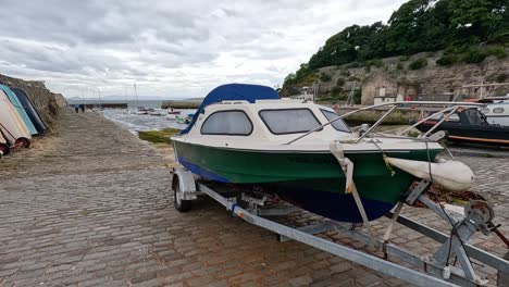 docked boats at a scenic scottish harbour