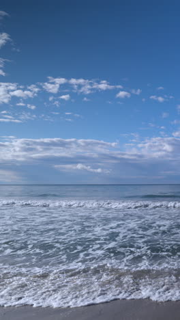 sea-tide-on-beach-in-vertical