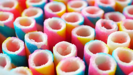 close up view of colorful spiral candy tubes