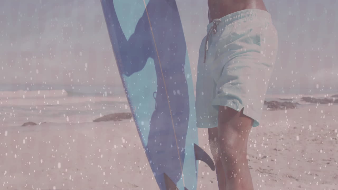 male surfer standing on sandy beach shore, with animated wave chart and sports marketing icons