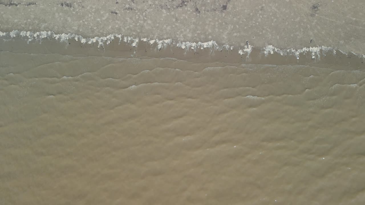 Aerial Drone View During Summer Alit Fishing Village,Kabong With, Facing Open Blue Sea, White Sandy Beach,Green Coconut, Palm Trees,And River,Sarawak,Borneo