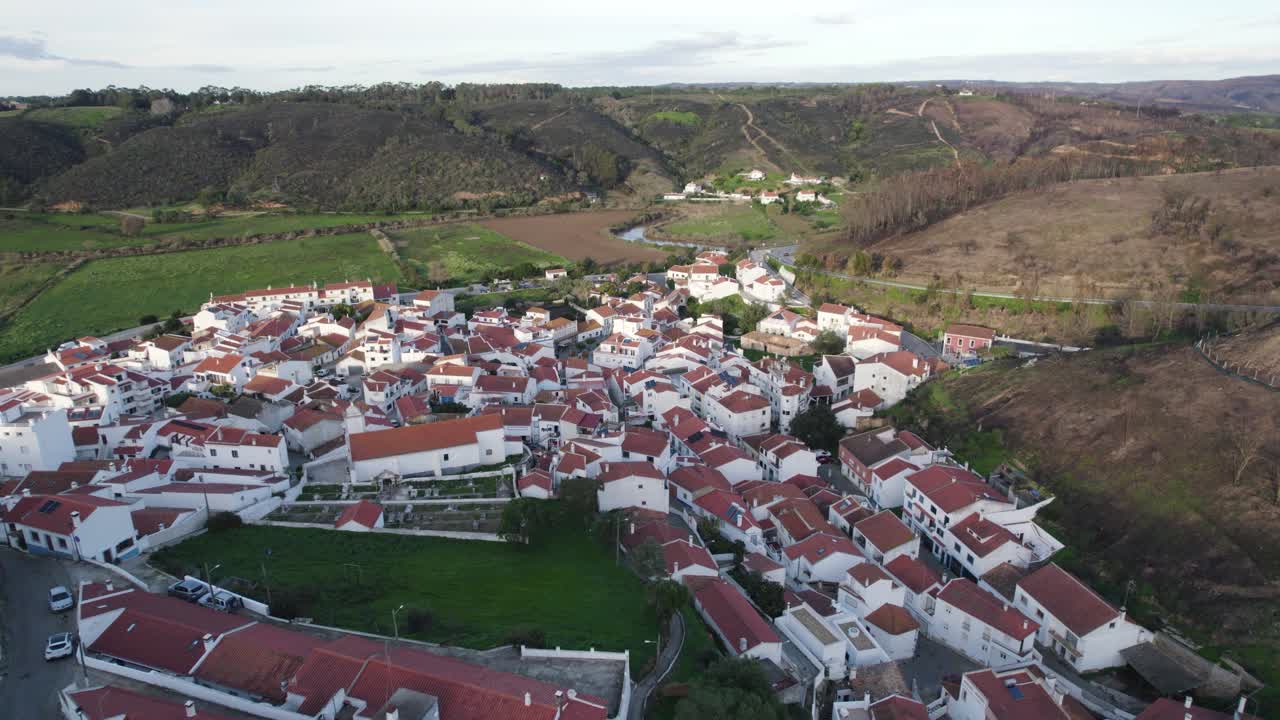 Odeceixe village aerial view, Portugal's serene coast - Aerial flyover