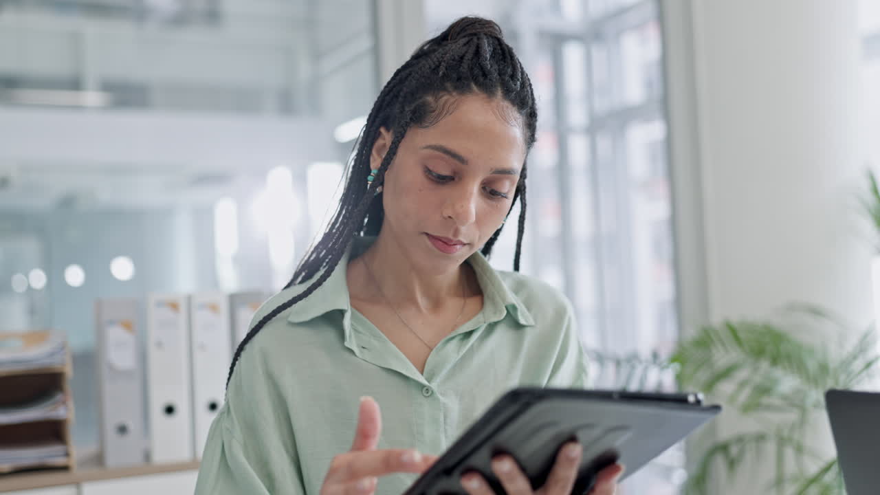 Business, tablet and woman in office for research
