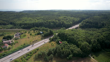 Traffic-on-autobahn-in-Europe,-distant-aerial-view