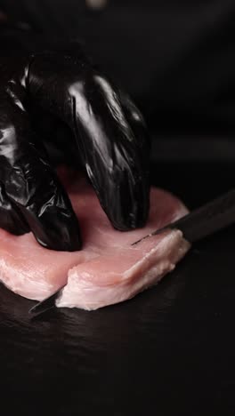 chef preparing pork chop