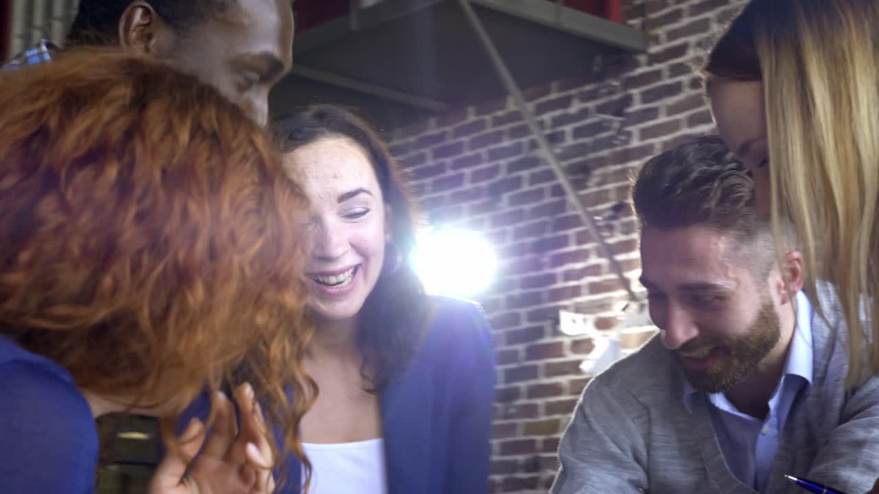 People laughing and interacting