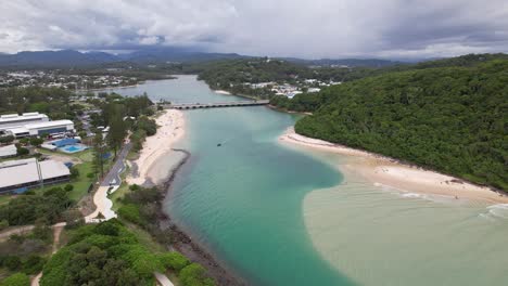 tallebudgera creek, park, bridge and beach - burleigh heads national park in gold coast, qld, australia. - aerial shot