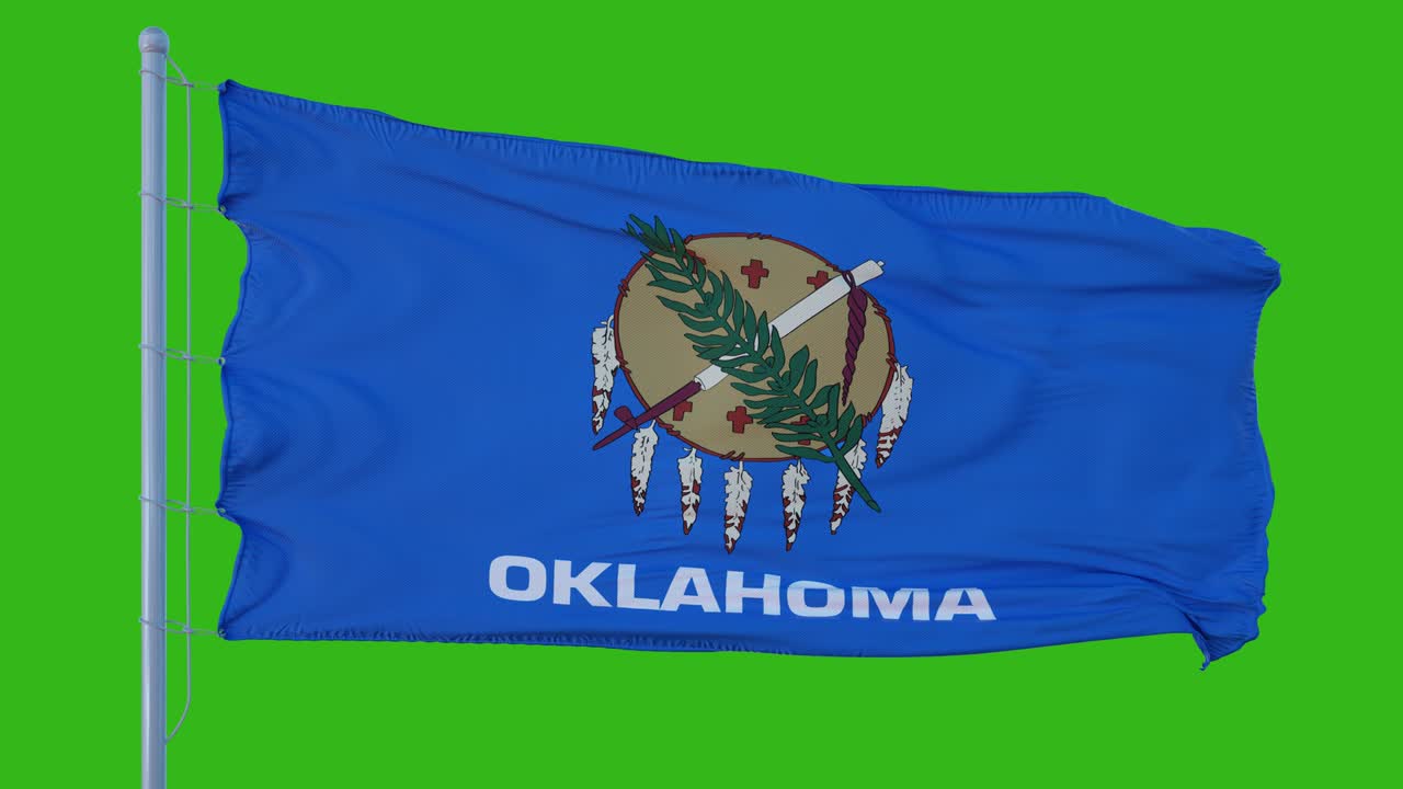 bandera del estado de oklahoma ondeando en el viento contra el fondo de la pantalla verde