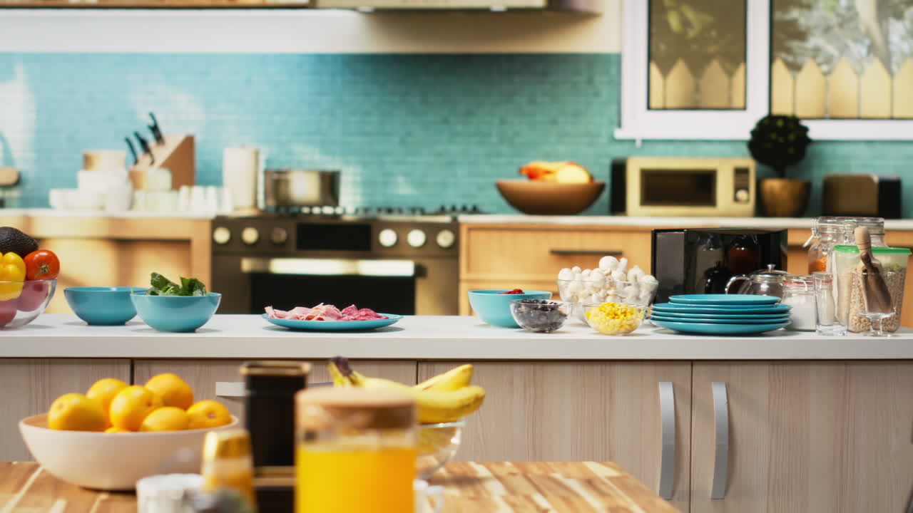 Empty kitchen with wooden dining furniture and modern appliances