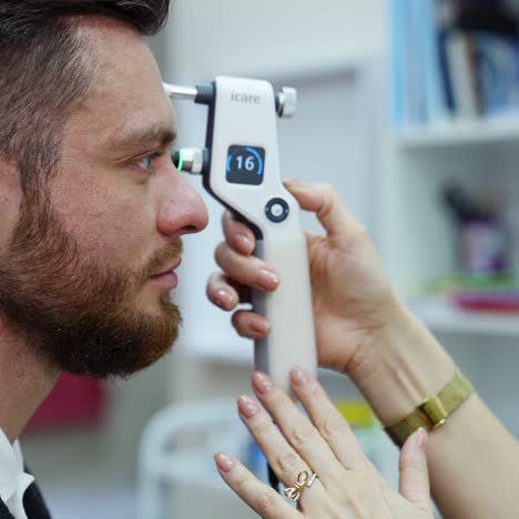 young man checking up vision