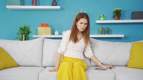 the young woman who smells bad odor is disturbed and disgusted.