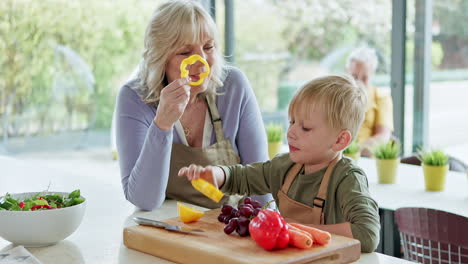 grandmother and grandson preparing food together