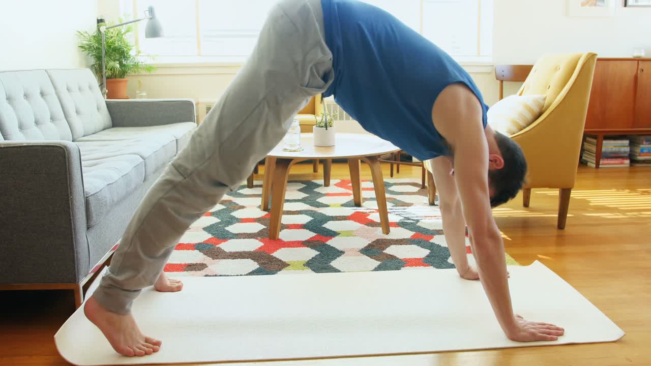 Man exercising in living room 4k