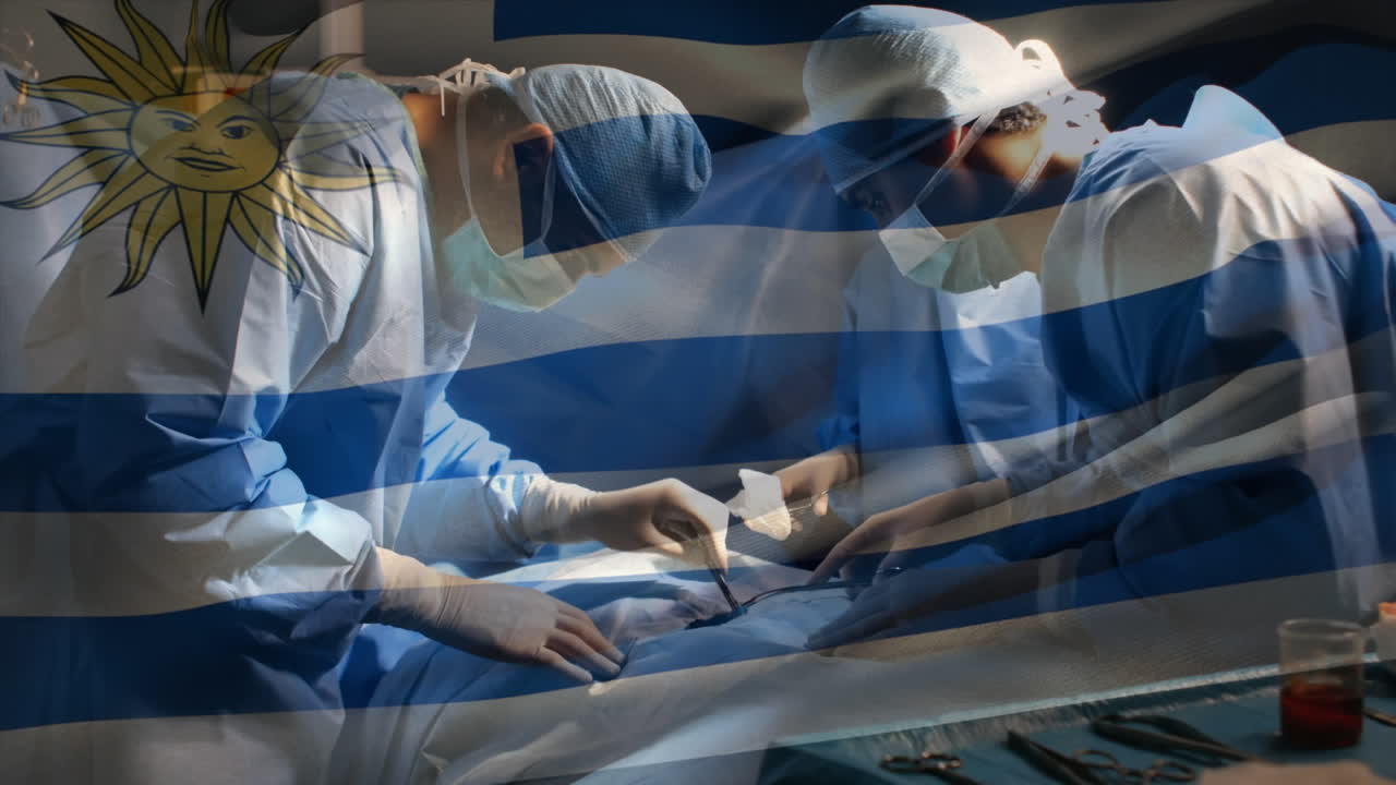 animación de la bandera de uruguay ondeando sobre los cirujanos en la sala de operaciones