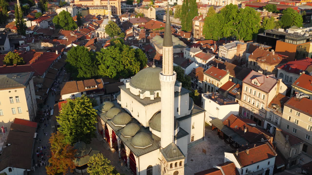 Aerial View Of Gazi Husrev-beg Mosque And Sarajevo Clock Tower During Sunset In Sarajevo, Bosnia and Herzegovina