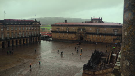 Pan-Shot-of-Plaza-del-Obradoiro-in-Rain