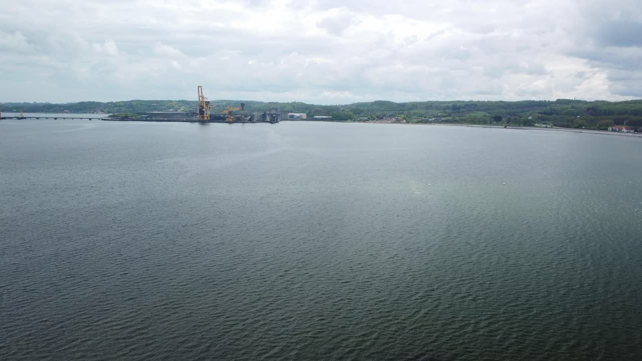 Industrial Crane subtract from ocean floor, wide aerial view