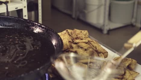 chef preparing deep fried pastry