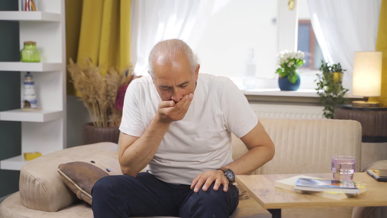 The sick old man can't stop coughing.