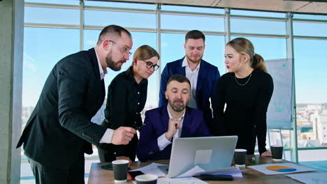 business executives interacting with each other in conference room at office