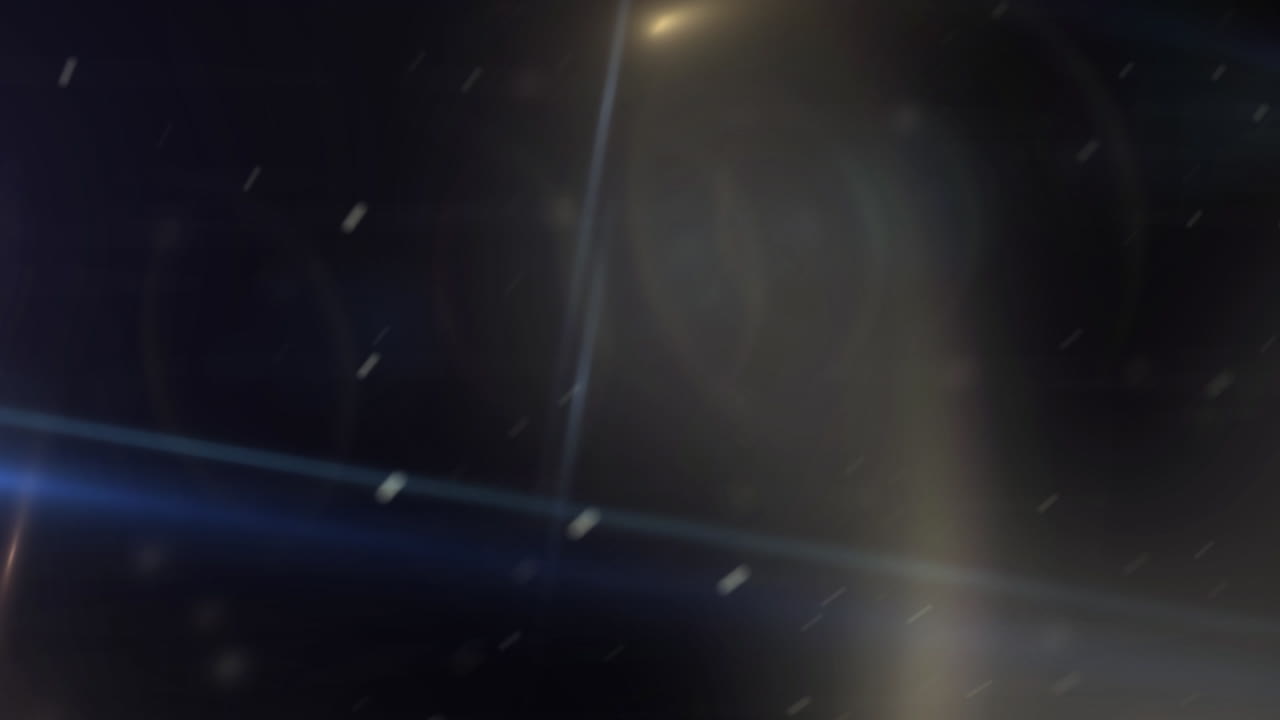 Lens flare dinamici con particelle di polvere fluttuanti su sfondo scuro