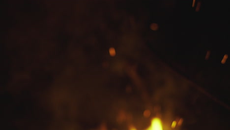 fire sparks and smoke at night