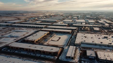 endless expanse of giant warehouses in the snowy calgary industrial zone