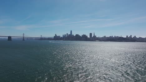 low flying over the san francisco bay drone shot of downtown san francisco