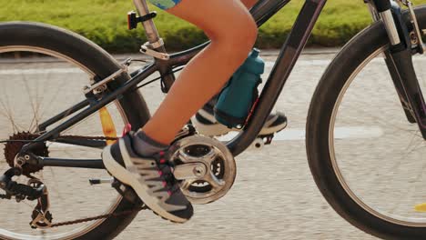 man ride bicycle near beach in barcelona, city morning, carbon neutral transportation. travel, sustainability and cycling with male speed and transit,