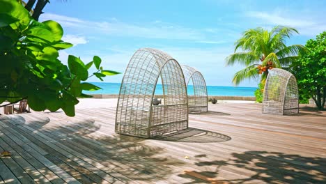 wide static shot of tropical luxury beach resort at the seaside