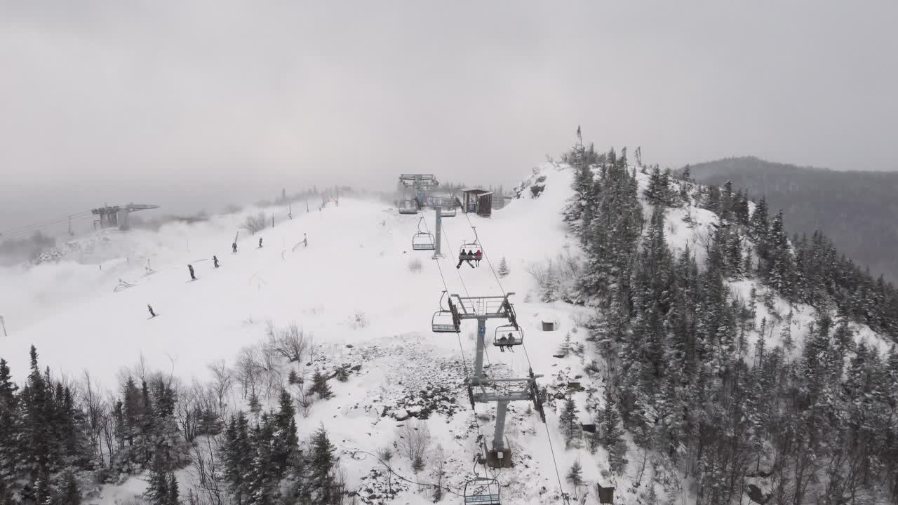 Mont Orford, Québec - majestic snow-covered mountain and ski resort.