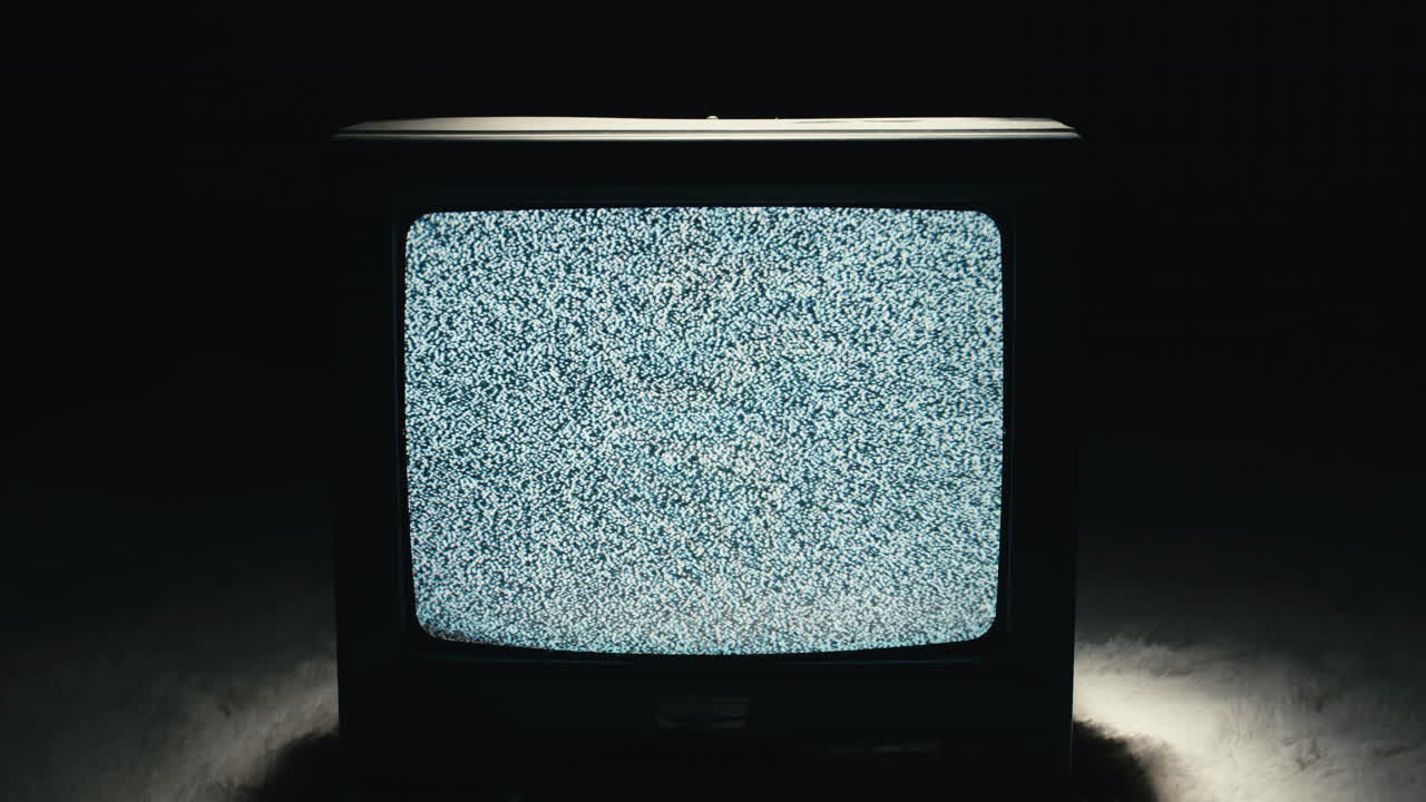 pantalla de televisión que muestra ruido estático