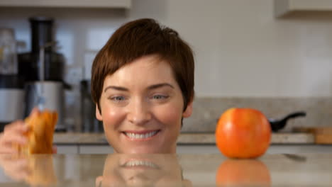 woman grabbing a croissant