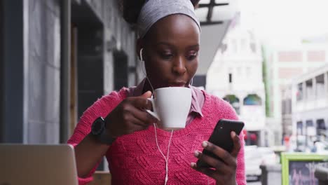 african american sitting in a cafe