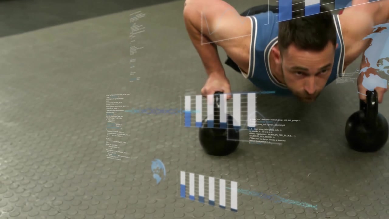 Male athlete performing kettlebell push-up in gym, initiating charts filling with live fitness data